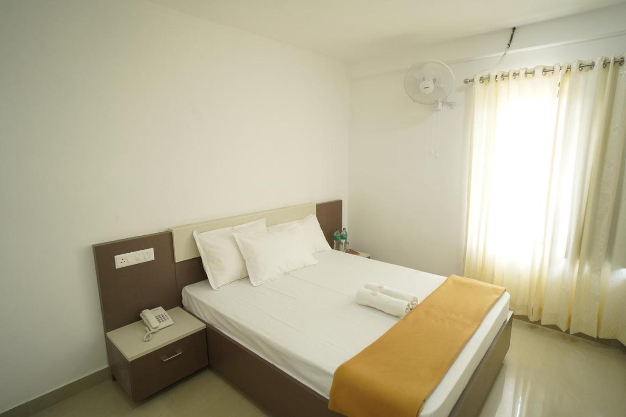 Sn Rooms Perumpavur Екстер'єр фото