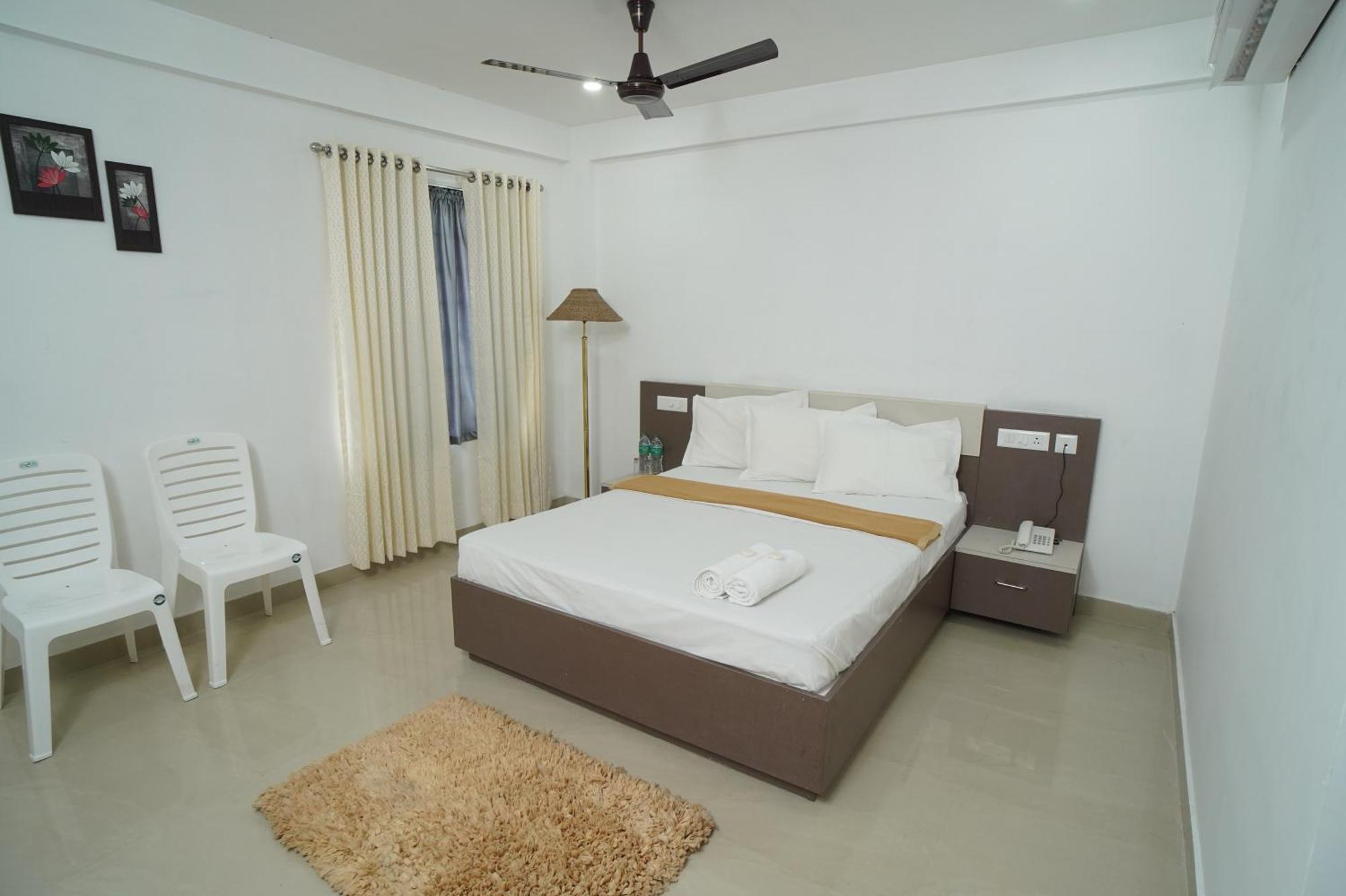 Sn Rooms Perumpavur Екстер'єр фото